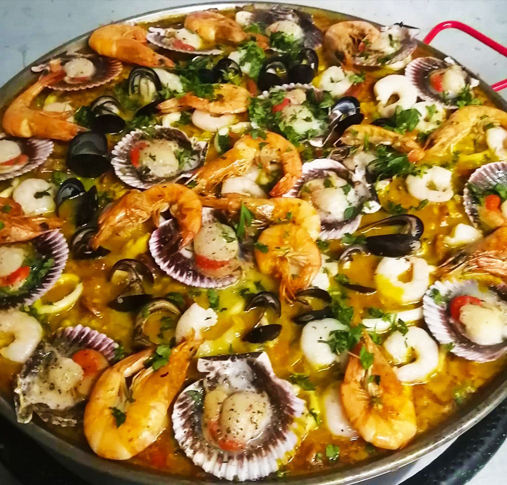 Paella Ostiones y Langostinos